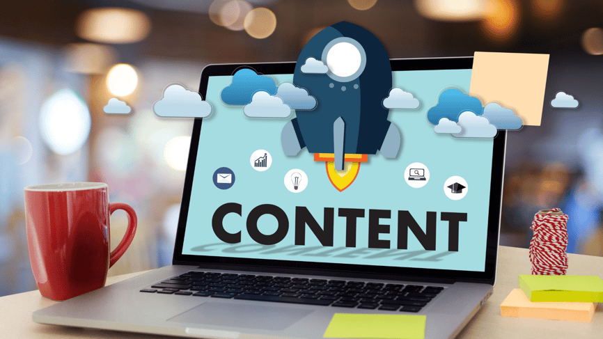 Content Marketing Strategy Tools | Laptop on Desk with Content Screen