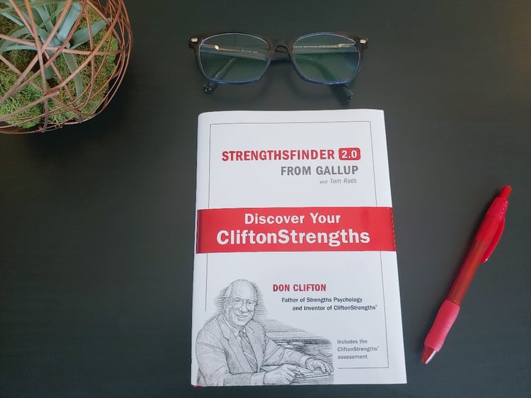 Sales Book | Strengthsfinder book on desk