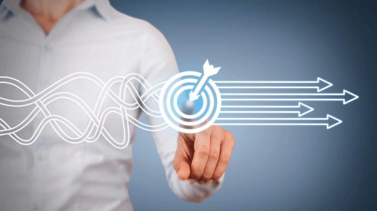 Website Redesign Best Practices | Set Goals | Business man pointing to target