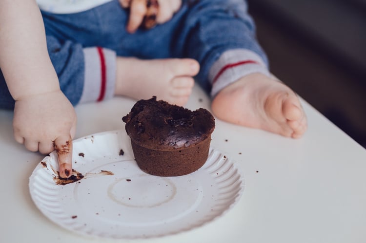 be a video marketing master - know your audience - baby with chocolate cake